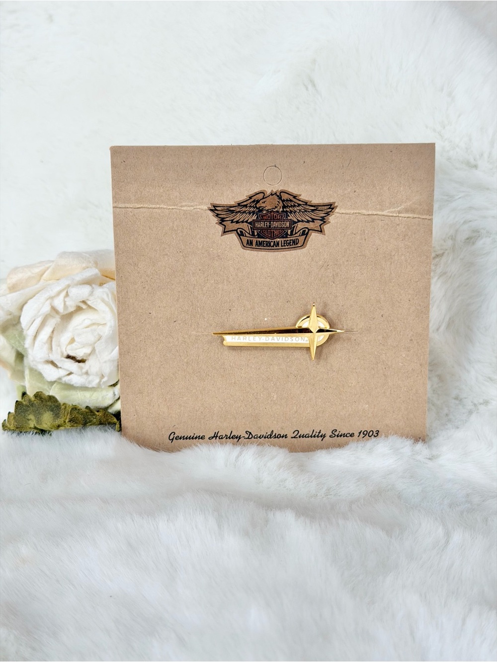 Harley-Davidson Vintage gun sight logo/lapel pin. Gold tone metal star burst